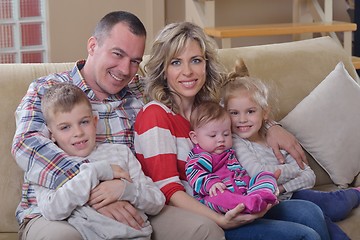 Image showing happy young family at home