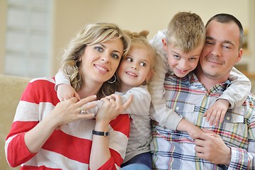 Image showing happy young family at home