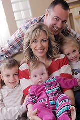 Image showing happy young family at home