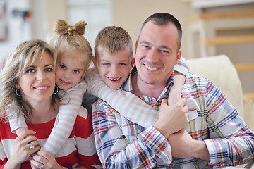 Image showing happy young family at home