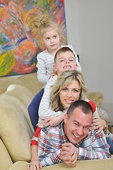 Image showing happy young family at home