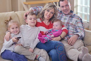 Image showing happy young family at home