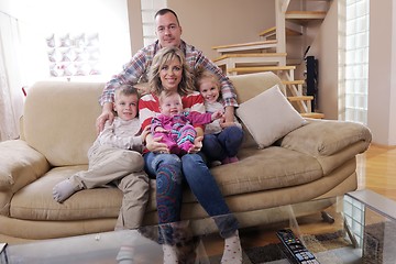 Image showing happy young family at home