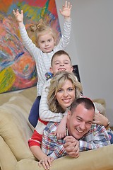 Image showing happy young family at home