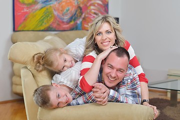 Image showing happy young family at home