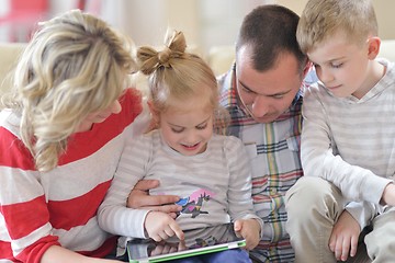 Image showing happy young family at home