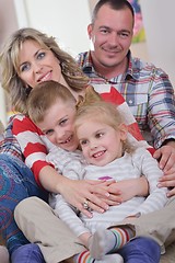 Image showing happy young family at home