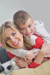 Image showing happy young family at home