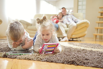 Image showing happy young family at home