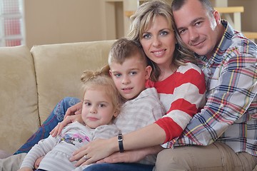 Image showing happy young family at home