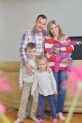 Image showing happy young family at home