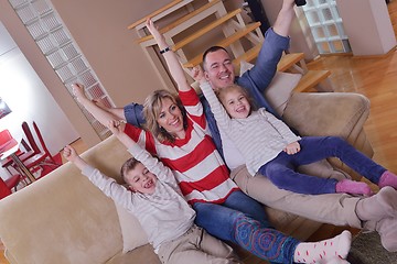 Image showing happy young family at home