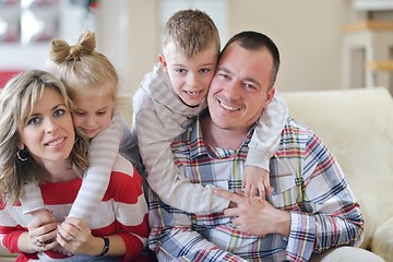 Image showing happy young family at home