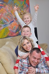 Image showing happy young family at home