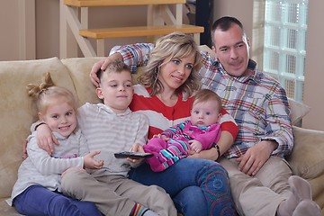 Image showing happy young family at home