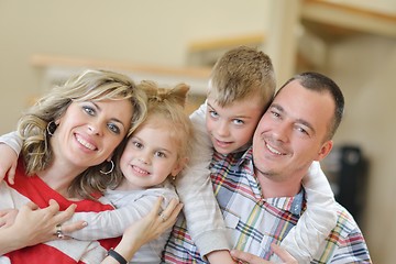 Image showing happy young family at home