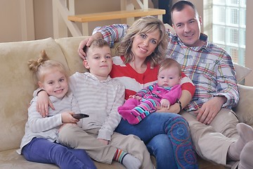 Image showing happy young family at home