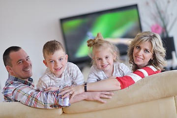 Image showing happy young family at home