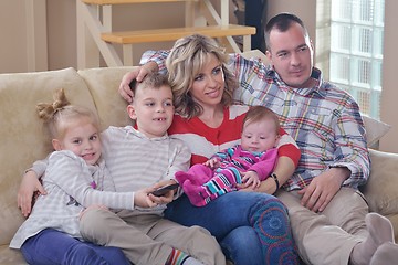 Image showing happy young family at home