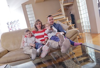 Image showing happy young family at home