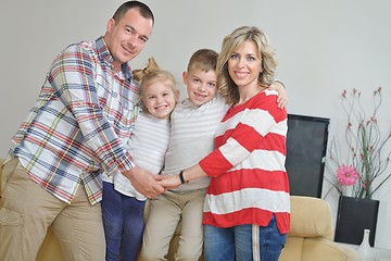 Image showing happy young family at home