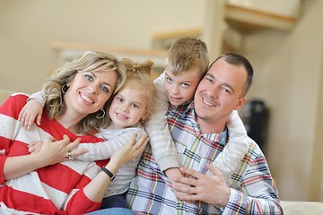 Image showing happy young family at home