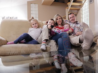 Image showing happy young family at home