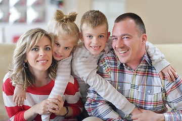 Image showing happy young family at home