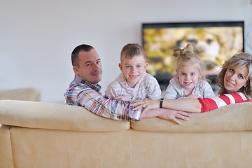 Image showing happy young family at home