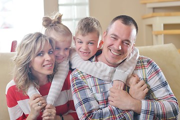 Image showing happy young family at home