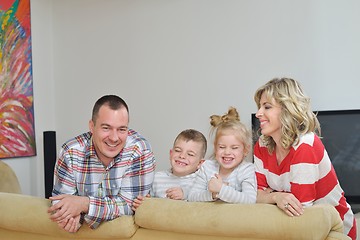 Image showing happy young family at home