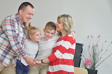 Image showing happy young family at home