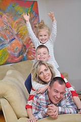 Image showing happy young family at home