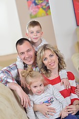 Image showing happy young family at home