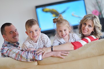 Image showing happy young family at home