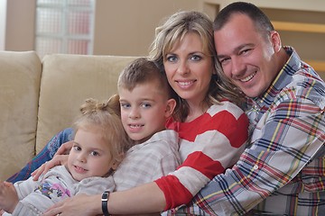 Image showing happy young family at home