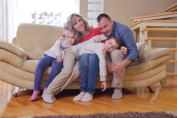 Image showing happy young family at home