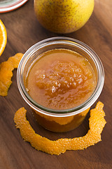 Image showing glass of pear jam with orange
