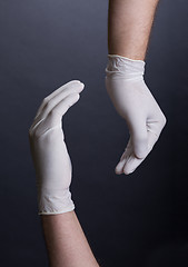 Image showing Male hands in latex gloves