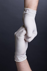 Image showing Male hands in latex gloves