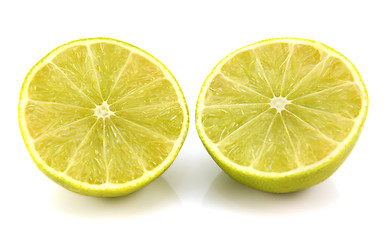 Image showing Fresh lime fruit cut in half showing cross section
