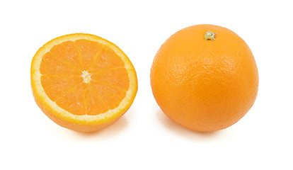 Image showing Whole orange and half fruit showing cross section