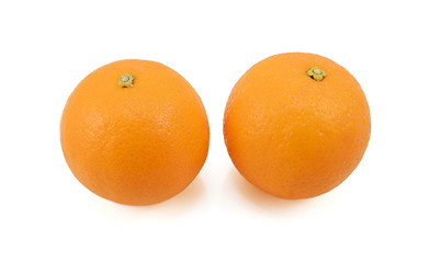 Image showing Two whole ripe oranges