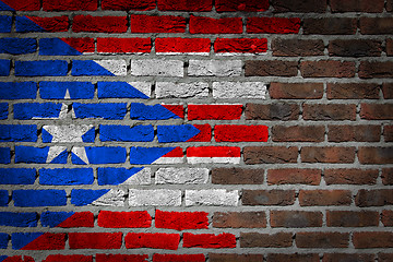 Image showing Brick wall texture with flag