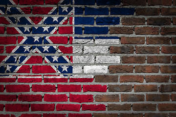 Image showing Brick wall texture with flag