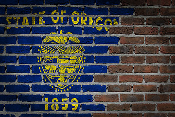 Image showing Brick wall texture with flag