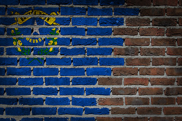 Image showing Brick wall texture with flag