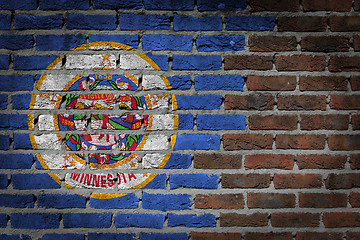 Image showing Brick wall texture with flag