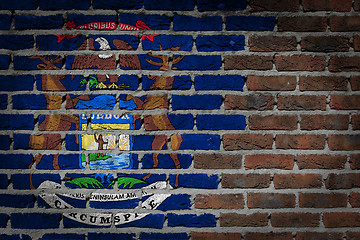 Image showing Brick wall texture with flag