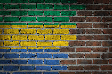 Image showing Brick wall texture with flag